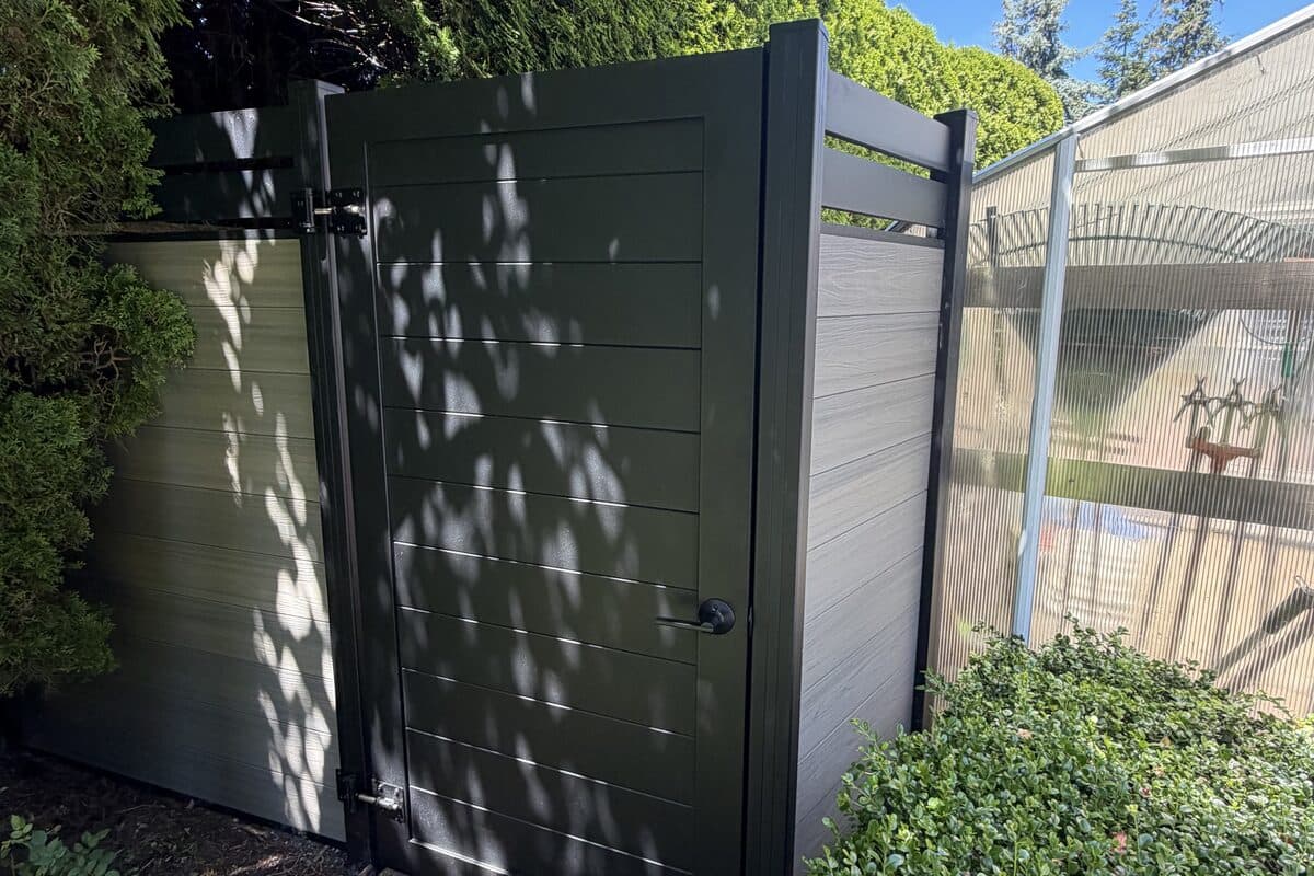 Completed Proline semi-privacy gate with black aluminum framing